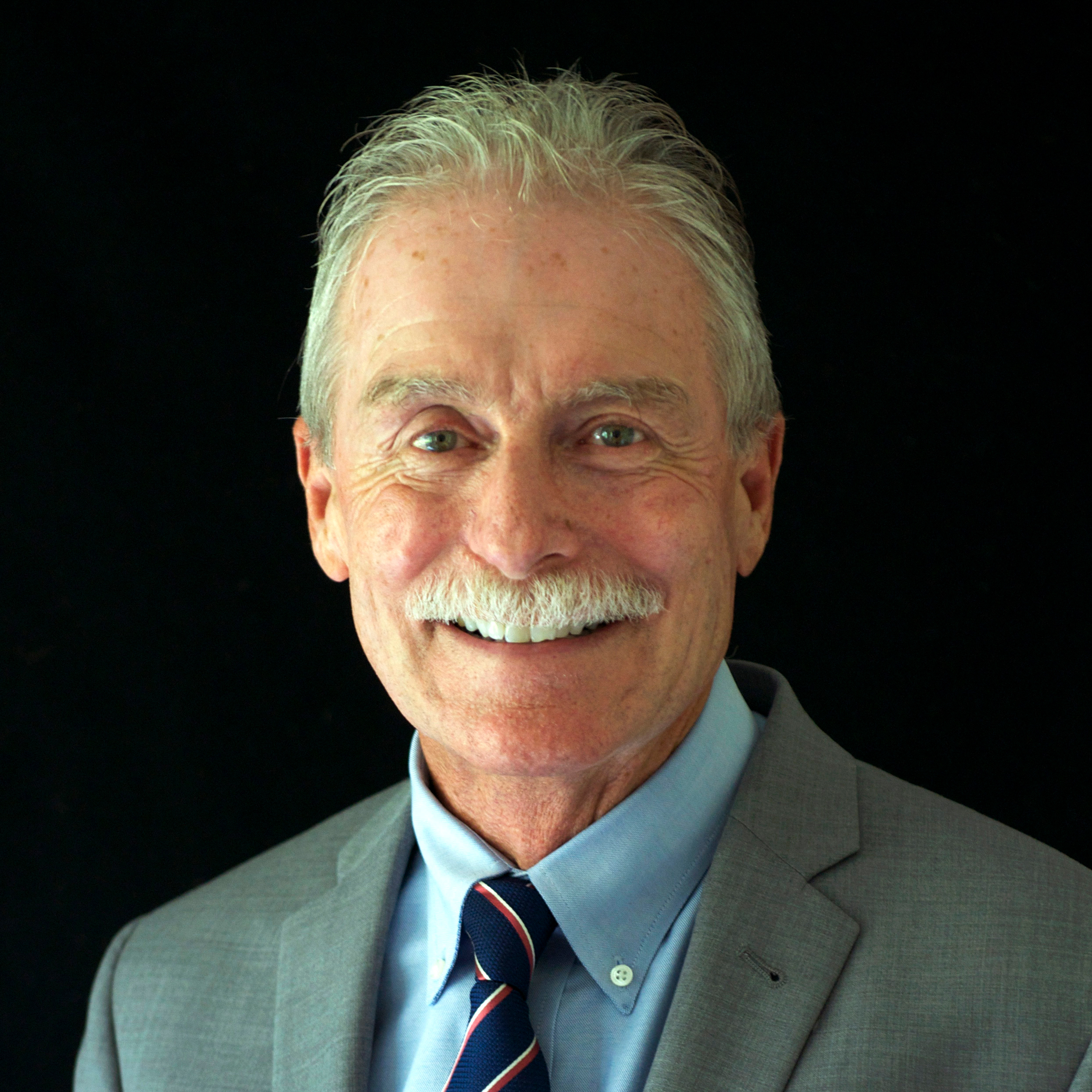 A headshot of Richard C. Rhodes III