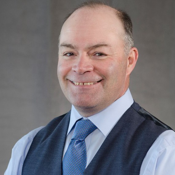 A headshot of Bret W. Hess