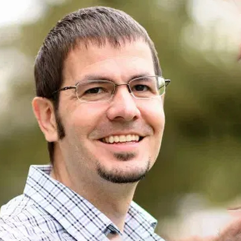 Timothy J. Hackmann's Headshot Image
